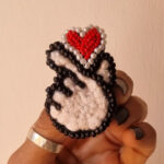 pinch of love brooch