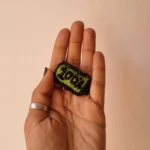 100% Battery Brooch