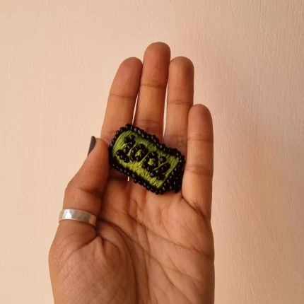 100% Battery Brooch